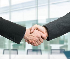 bigstock-Businessmen-shaking-hands-to-s-42928921-merger-hired-hiring