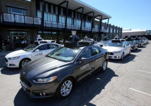 A fleet of Uber's Ford Fusion self driving cars are shown during a demonstration of self-driving automotive technology in Pittsburgh. REUTERS/Aaron Josefczyk