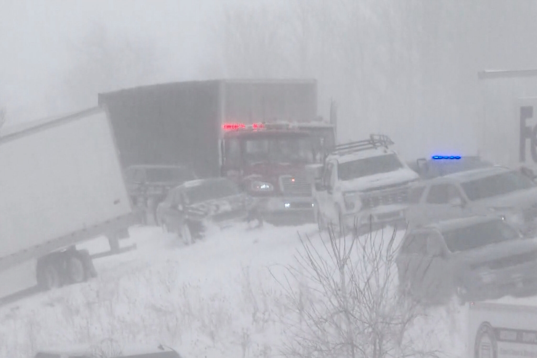 Massive Snowstorm Causes 100 Vehicle Pileup in Michigan Crash