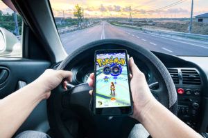 bigstock--138508466-pokemon go driving