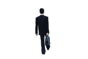 Businessman Walking On White -- exit