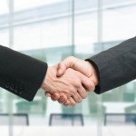 bigstock-Businessmen-shaking-hands-to-s-42928921-merger-hired-hiring