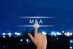 Hand Pushing M&a Or Merger And Acquisition Button On Touch Scree