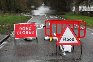 Road closed and flood sign due to heavy rain and floods