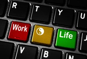 Work life balance concept on laptop keyboard.